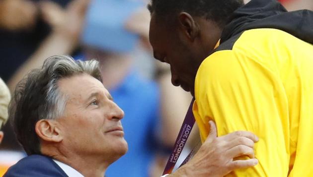 IAAF president Sebastian Coe presents Usain Bolt his bronze medal at the podium ceremony of the men’s 100m event at the IAAF World Championships of Athletics in London on Sunday. (REUTERS)
