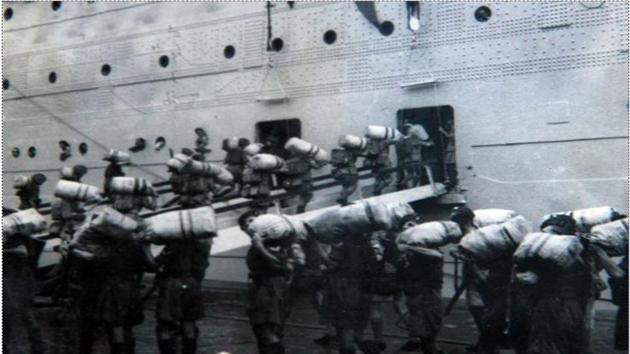 British troops, part of the Royal Norfolk Regiment embark on the SS Georgic bound for Britain after the independence of India, on August 17, 1947. (AFP) 