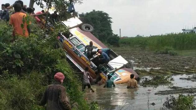 The bus that plunged in a ditch in Nadia district. (HT Photo) The bus that plunged in a ditch in Nadia district. (HT Photo)