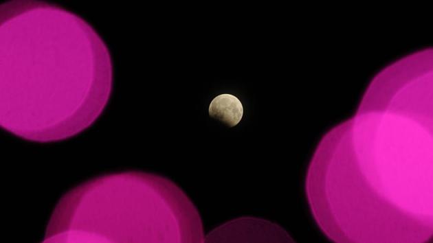 Partial Lunar Eclipse seen in Kolkata. According to SPACE (Science Popularisation Association of Communicators and Educators ), the penumbral eclipse began at 9.22 p.m. on August 7 and ended at 2.20 a.m. on August 8. (Samir Jana/HT PHOTO)
