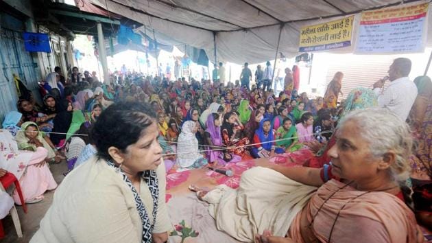 Dhar : Narmada Bachao Andolan (NBA) leader Medha Patkar during her indefinite fast in Chikhlada in Dhar district seeking proper rehabilitation of the families which would be displaced following the submergence of the village in Dhar. (PTI) Dhar : Narmada Bachao Andolan (NBA) leader Medha Patkar during her indefinite fast in Chikhlada in Dhar district seeking proper rehabilitation of the families which would be displaced following the submergence of the village in Dhar. (PTI)