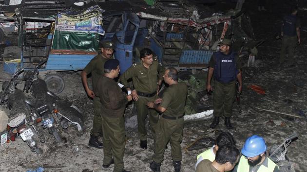 Pakistani security personnel visit the site of a blast in Lahore, Pakistan, Monday, Aug. 7, 2017. (AP) Pakistani security personnel visit the site of a blast in Lahore, Pakistan, Monday, Aug. 7, 2017. (AP)