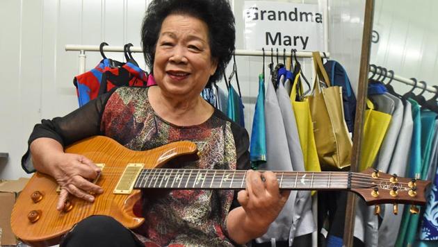 Mary Ho, also known as Grandma Mary, posing with her electric guitar during a rehearsal in Singapore on August 5, 2017. (AFP) Mary Ho, also known as Grandma Mary, posing with her electric guitar during a rehearsal in Singapore on August 5, 2017. (AFP)