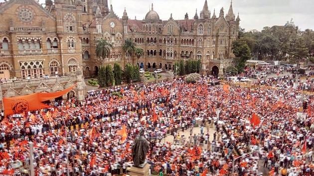 CST is engulfed in a sea of saffron as protesters make their way to the iconic terminus. (Kunal Patil/HT) CST is engulfed in a sea of saffron as protesters make their way to the iconic terminus. (Kunal Patil/HT)