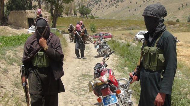 Fighters with Afghanistan's Taliban militia stand with their weapons in Ahmad Aba district on the outskirts of Gardez, the capital of Paktia province, on July 18, 2017. (AFP) Fighters with Afghanistan's Taliban militia stand with their weapons in Ahmad Aba district on the outskirts of Gardez, the capital of Paktia province, on July 18, 2017. (AFP)