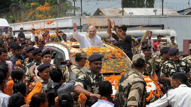 BJP national president Amit Shah waves at supporters after his arrival at the Agartala airport in Tripura recently. (PTI photo) BJP national president Amit Shah waves at supporters after his arrival at the Agartala airport in Tripura recently. (PTI photo)