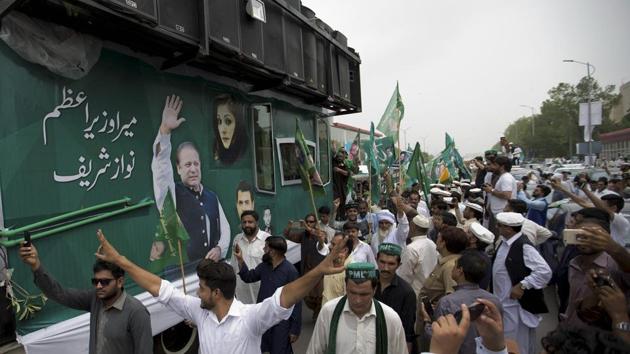 A convoy of deposed Prime Minister Nawaz Sharif leaves Islamabad, Pakistan on Wednesday. (AP) A convoy of deposed Prime Minister Nawaz Sharif leaves Islamabad, Pakistan on Wednesday. (AP)