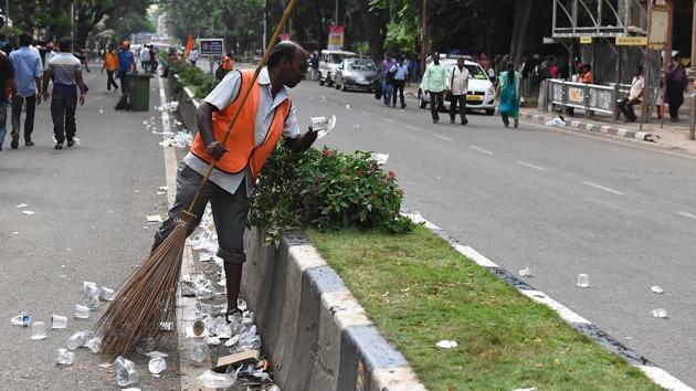 There were 3,500 volunteers to clean the city’s streets and dispose of trash left behind by protesters. (Satyabrata Tripathy/HT Photo) 