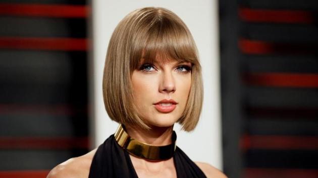 (File) Singer Taylor Swift has accused DJ Mueller of slipping his hand under her dress and grabbing her buttock in 2013.