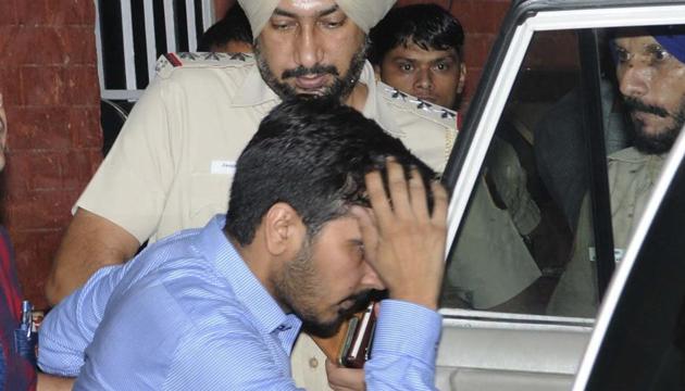 Vikas Barala in Chandigarh police custody at the Sector-26 police station on Wednesday, August 9. (Keshav Singh/HT) Vikas Barala in Chandigarh police custody at the Sector-26 police station on Wednesday, August 9. (Keshav Singh/HT)