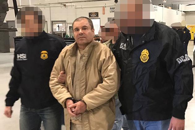 Joaquin "El Chapo" Guzman (C) is escorted by Mexican police as he is extradited to the United States. (AFP File) Joaquin "El Chapo" Guzman (C) is escorted by Mexican police as he is extradited to the United States. (AFP File)