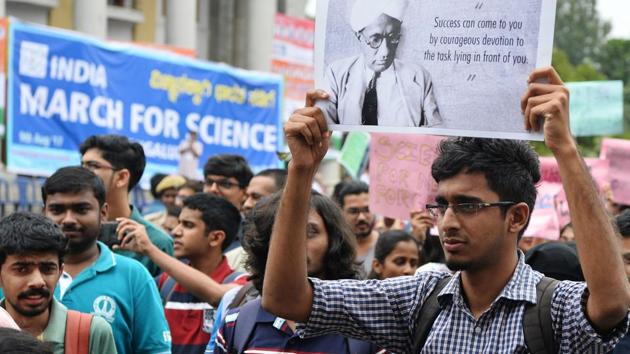 A student holds placards during the March for Science rally in Bengaluru on Wednesday. (AFP Photo) A student holds placards during the March for Science rally in Bengaluru on Wednesday. (AFP Photo)