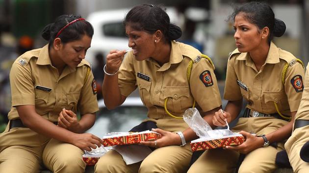 Policewomen take a break. (Pratik Chorge/HT Photo) 