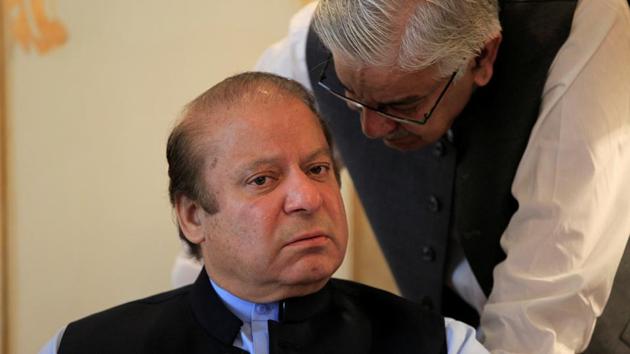 Former Pakistan prime minister Nawaz Sharif speaks with foreign minister Khawaj Asif during a meeting in Islamabad on August 9, 2017. (Reuters) Former Pakistan prime minister Nawaz Sharif speaks with foreign minister Khawaj Asif during a meeting in Islamabad on August 9, 2017. (Reuters)