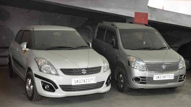 Covered in dust, cars remain parked inside the Commercial Complex in Dehradun for months. (Vinay Santosh Kumar/HT) Covered in dust, cars remain parked inside the Commercial Complex in Dehradun for months. (Vinay Santosh Kumar/HT)