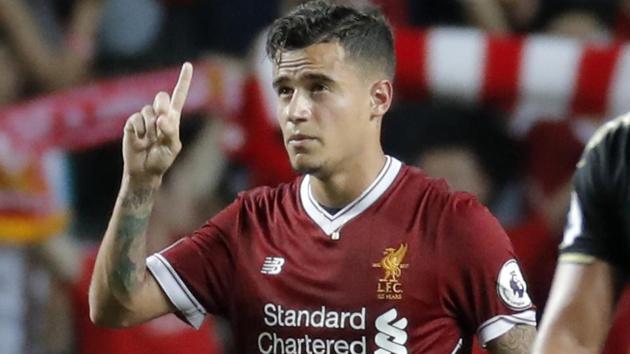 Liverpool's Philippe Coutinho celebrates after scoring a goal during the final match against Leicester City FC. (AP) Liverpool's Philippe Coutinho celebrates after scoring a goal during the final match against Leicester City FC. (AP)