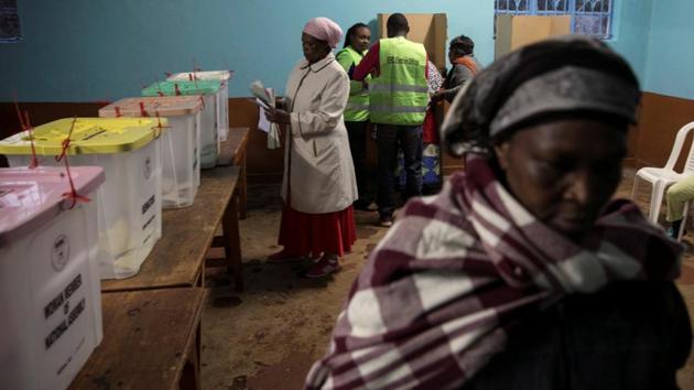 A woman casts her vote during the presidential election at a polling station in Gatundu, Kenya. Post-election violence in 2007 killed more than 1,400 people and displaced half a million, plunging the country into outright civil war. In 2013, Odinga lost again to Uhuru Kenyatta. There was no violence then, but the result was controversial over claims of electoral rigging. (Baz Ratner/REUTERS)