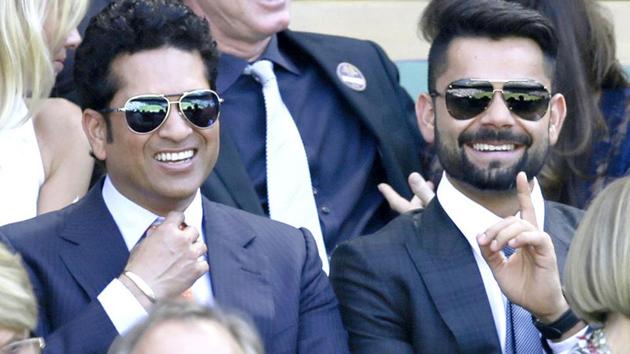 Sachin Tendulkar and Indian cricket team skipper Virat Kohli seen in the Royal Box on Centre Court at the All England Lawn Tennis Championships in Wimbledon. (AP) Sachin Tendulkar and Indian cricket team skipper Virat Kohli seen in the Royal Box on Centre Court at the All England Lawn Tennis Championships in Wimbledon. (AP)
