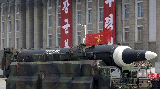 A missile believed to be the North Korean Hwasong-12 is paraded across Kim Il Sung Square in Pyongyang, North Korea. North Korea said Wednesday that it was examining operational plans for an attack on Guam, in reaction to U.N. punishment for recent North Korean intercontinental ballistic missile tests and a US suggestion about preparations for possible preventive attacks to stop the DPRK’s nuclear weapons program. (Wong Maye-E / AP File)