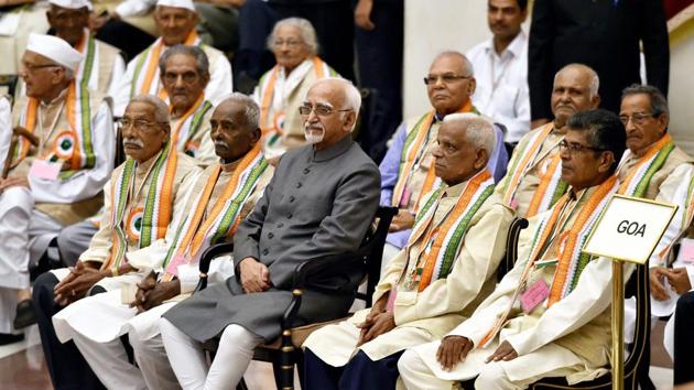 Vice president Hamid Ansari in a group photograph with the freedom-fighters during an At Home, hosted in their honour at Rashtrapati Bhavan in New Delhi on the occasion of August Kranti Day on Wednesday.(PTI Photo) Vice president Hamid Ansari in a group photograph with the freedom-fighters during an At Home, hosted in their honour at Rashtrapati Bhavan in New Delhi on the occasion of August Kranti Day on Wednesday.(PTI Photo)