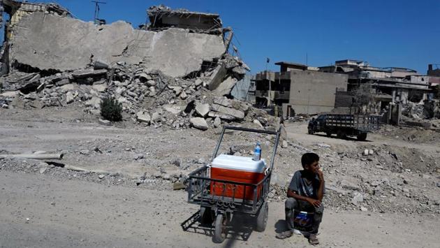 As life slowly recedes to normalcy, the residents of Mosul are still haunted by the dead bodies still buried under the rubble of the Old City. Mosul’s road to recovery however still seems a long arduous journey in the face of a collapsed economy and an ancient city left a shell of its former self. (Suhaib Salem / REUTERS)
