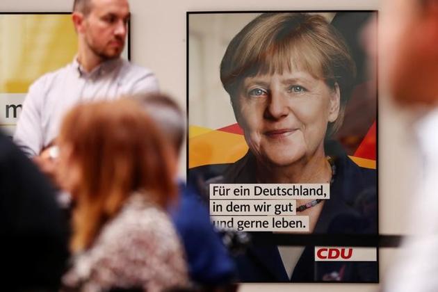 The Christian Democratic Union presents a new posters for the upcoming election campaign in Berlin on August 7, 2017. (Reuters) The Christian Democratic Union presents a new posters for the upcoming election campaign in Berlin on August 7, 2017. (Reuters)