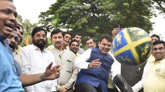 SHOE-MARKER: CM Devendra Fadnavis’ shoe goes flying with the ball as he kicks off a football match between the Speaker’s Eleven and Chairman’s Eleven. The state’s legislators played a game at Vidhan Bhavan on Thursday to promote the upcoming FIFA U17 World Cup. (Anshuman Poyrekar/HT Photo)