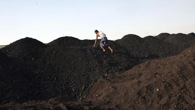 For years, the country has argued in global climate talks that it should have the unfettered right to expand its coal power generation to aid its development and raise hundreds of millions of people out of poverty. However with a decrease in investment in the coal-fired power plants, India’s shift to a more renewable and energy efficient state could be ushered in earlier than expected. (Rajanish Kakade/AP) For years, the country has argued in global climate talks that it should have the unfettered right to expand its coal power generation to aid its development and raise hundreds of millions of people out of poverty. However with a decrease in investment in the coal-fired power plants, India’s shift to a more renewable and energy efficient state could be ushered in earlier than expected. (Rajanish Kakade/AP)
