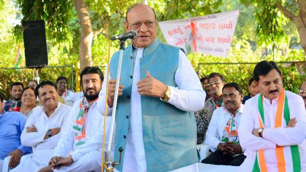 Former Gujarat chief minister Shankersinh Vaghela says he will neither join the BJP or float a new party, a dat after Congress expeledd him and seven other legislators from the party for cross-voting in the Rajya Sabha elections. (PTI File Photo) Former Gujarat chief minister Shankersinh Vaghela says he will neither join the BJP or float a new party, a dat after Congress expeledd him and seven other legislators from the party for cross-voting in the Rajya Sabha elections. (PTI File Photo)