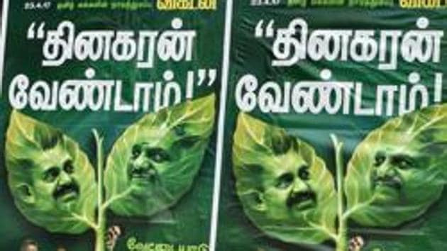 A poster of a magazine displaying the picture of Chief Minister E Palaniswami and his rival O Panneerselvam on the two leaves depicting the AIADMK party symbol, Chennai. (File Photo) (PTI) A poster of a magazine displaying the picture of Chief Minister E Palaniswami and his rival O Panneerselvam on the two leaves depicting the AIADMK party symbol, Chennai. (File Photo) (PTI)