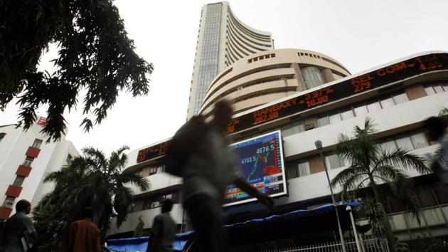 Reports from National Stock Exchange and BSE Sensex and Rupee plunges 19 paise against US dollar. (Reuters File Photo) Reports from National Stock Exchange and BSE Sensex and Rupee plunges 19 paise against US dollar. (Reuters File Photo)