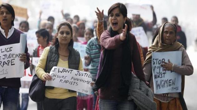A file photo of people protesting against the gang-rape of a woman on a moving bus in New Delhi. (HT Photo) A file photo of people protesting against the gang-rape of a woman on a moving bus in New Delhi. (HT Photo)
