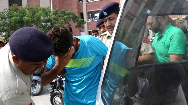 Ashish Kumar being produced in district courts in Chandigarh on Thursday. (Ravi Kumar/HT) Ashish Kumar being produced in district courts in Chandigarh on Thursday. (Ravi Kumar/HT)
