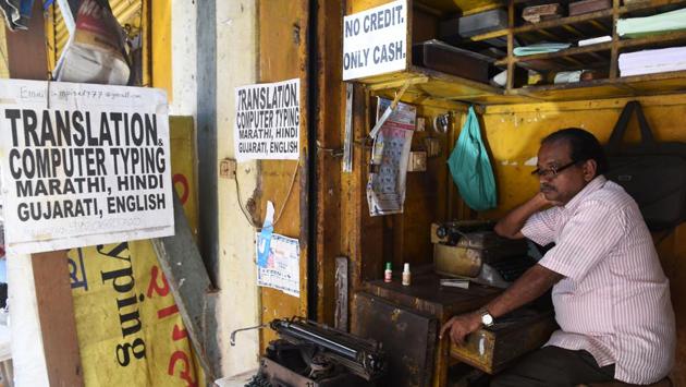 The signs of a turning tide have been on the horizon for years. According to a government resolution in 2013 ‘Typewriting machines are outdated, manufacturers have shut shop and there are no spare parts available in market. We need computer trained individuals for government offices as we adapt to e-governance.’. Typing institutes across the state have long stayed afloat held by a string of extensions. (Indranil Mukherjee / AFP) The signs of a turning tide have been on the horizon for years. According to a government resolution in 2013 ‘Typewriting machines are outdated, manufacturers have shut shop and there are no spare parts available in market. We need computer trained individuals for government offices as we adapt to e-governance.’. Typing institutes across the state have long stayed afloat held by a string of extensions. (Indranil Mukherjee / AFP)
