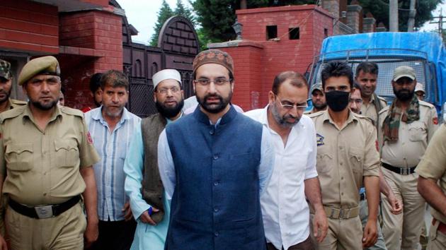 Mirwaiz Umar Farooq being detained by the police in Srinagar on July 13. (PTI File Photo) Mirwaiz Umar Farooq being detained by the police in Srinagar on July 13. (PTI File Photo)