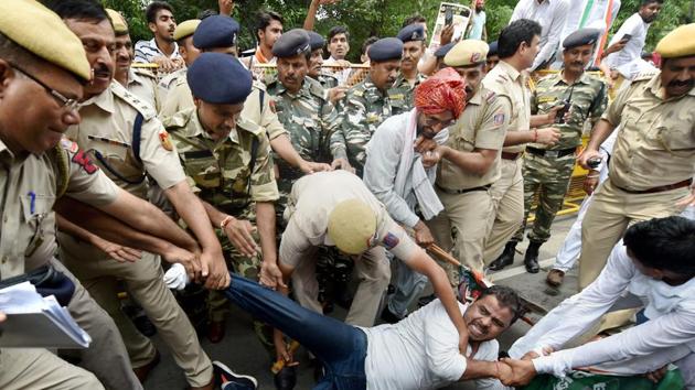 Police detain Youth Congress activists during "Bharat Bachao Andolan” protest against the NDA government at the Jantar Mantar, in New Delhi on Thursday. (PTI Photo) Police detain Youth Congress activists during "Bharat Bachao Andolan” protest against the NDA government at the Jantar Mantar, in New Delhi on Thursday. (PTI Photo)