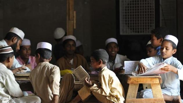 Rohingya Muslim children study at a Madrasa run by Rohingyas at one of their settlement in Narwal locality of Jammu town.(HT Photo/Waseem Andrabi) Rohingya Muslim children study at a Madrasa run by Rohingyas at one of their settlement in Narwal locality of Jammu town.(HT Photo/Waseem Andrabi)