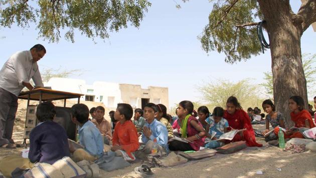 Students attend class under a tree at a government school in Rajasthan.(HT file photo/Picture for representational purpose only) Students attend class under a tree at a government school in Rajasthan.(HT file photo/Picture for representational purpose only)