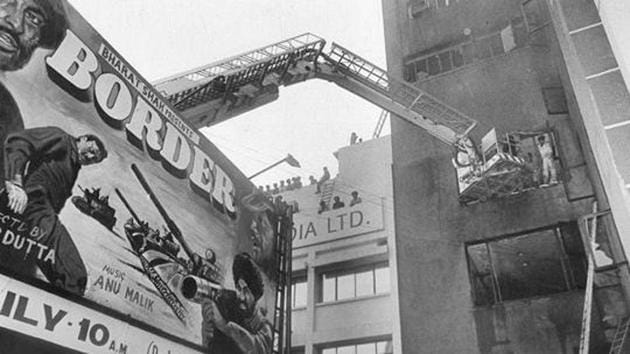 A major fire broke out in south Delhi's Uphaar Cinema on June 13, 1997. Firefighters and locals rescued many trapped inside, but 59 died due to asphyxiation. Over 100 were injured. (PTI file photo)