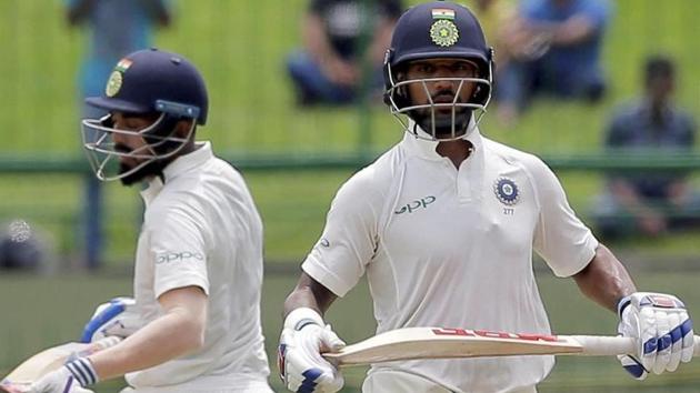 Indian cricket team’s Shikhar Dhawan and KL Rahul (left) during Day 1 of the third Test against Sri Lanka national cricket team in Pallekele on Saturday.(PTI)