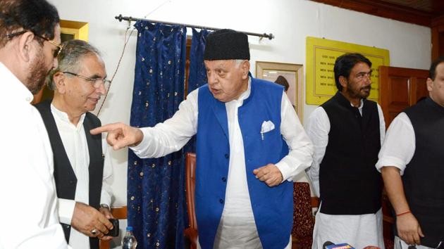 National Conference president Farooq Abdullah with state Congress chief Ghulam Ahmad Mir and other opposition leaders and MLAs after an all-party meeting on the issue of Article 35(A), in Srinagar recently. (PTI File Photo) National Conference president Farooq Abdullah with state Congress chief Ghulam Ahmad Mir and other opposition leaders and MLAs after an all-party meeting on the issue of Article 35(A), in Srinagar recently. (PTI File Photo)