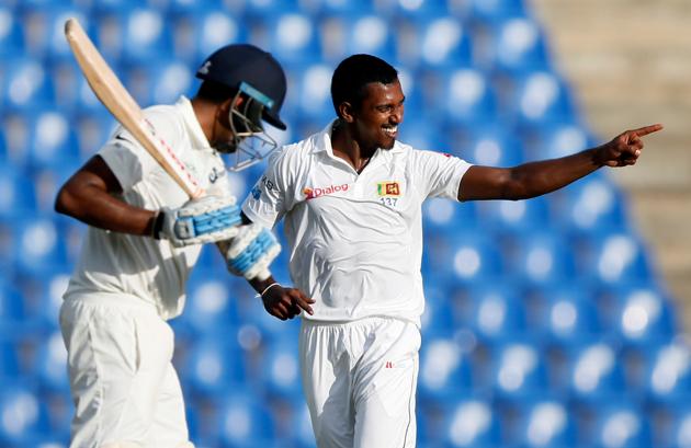 Sri Lanka's Vishwa Fernando celebrates after taking the wicket of India's Ravichandran Ashwin. (REUTERS)