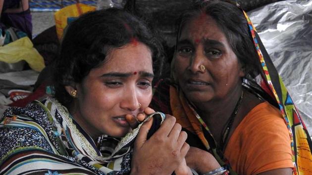 Relatives mourn the death of a child at Baba Raghav Das Medical College Hospital in Gorakhpur, Uttar Pradesh. (AP) Relatives mourn the death of a child at Baba Raghav Das Medical College Hospital in Gorakhpur, Uttar Pradesh. (AP)