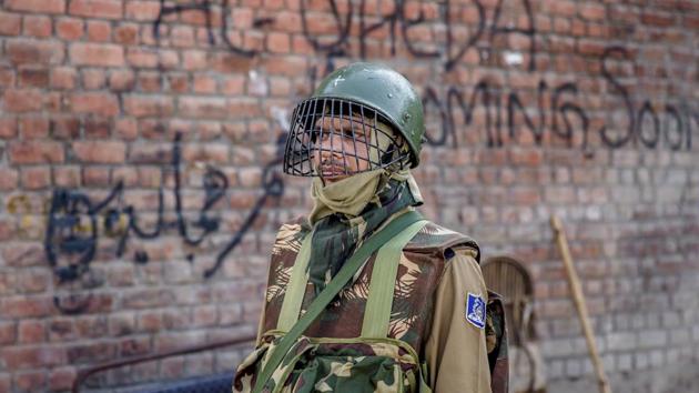 An Indian paramilitary soldier stands guard during curfew in Srinagar, Saturday. (AP Photo) An Indian paramilitary soldier stands guard during curfew in Srinagar, Saturday. (AP Photo)