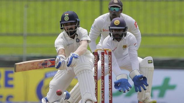 India's Lokesh Rahul, left, plays a shot during the first day's play of their 3rd Test match. (AP)