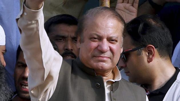 Deposed Pakistani Prime Minister Nawaz Sharif waves to his supporters while he arrives to address a rally in Gujrat, Pakistan on Friday. (AP photo) Deposed Pakistani Prime Minister Nawaz Sharif waves to his supporters while he arrives to address a rally in Gujrat, Pakistan on Friday. (AP photo)