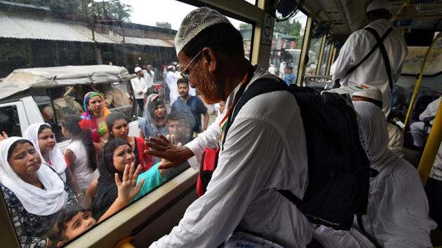 A Muslim pilgrim waves towards his relatives before leaving for the annual Haj pilgrimage to the holy city of Mecca, in Guwahati, in July. (Reuters File Photo) A Muslim pilgrim waves towards his relatives before leaving for the annual Haj pilgrimage to the holy city of Mecca, in Guwahati, in July. (Reuters File Photo)