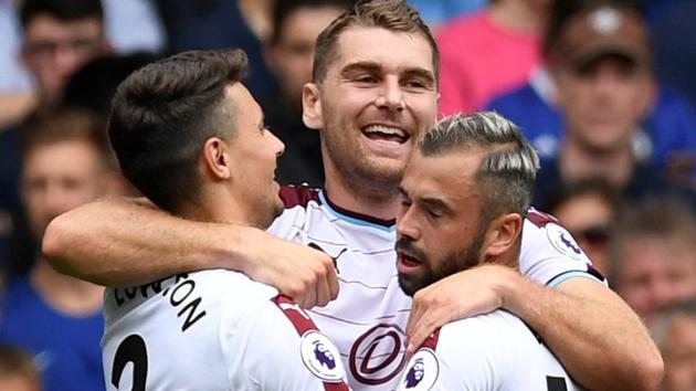 Burnley's Sam Vokes celebrates scoring their first goal with Matthew Lowton and Steven Defour against Chelsea. Get full football score from Chelsea vs Burnley, Premier League 2017-18, here. (Action Images via Reuters) Burnley's Sam Vokes celebrates scoring their first goal with Matthew Lowton and Steven Defour against Chelsea. Get full football score from Chelsea vs Burnley, Premier League 2017-18, here. (Action Images via Reuters)