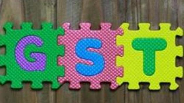 Colourful puzzle block letter with word GST on wood background (Getty Images/iStockphoto) Colourful puzzle block letter with word GST on wood background (Getty Images/iStockphoto)