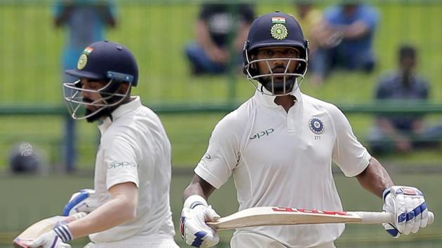 Indian cricket team openers Shikhar Dhawan (R) and KL Rahul in action on Day 1 of the third Test against Sri Lanka cricket team at Pallekele on Saturday.(AP)